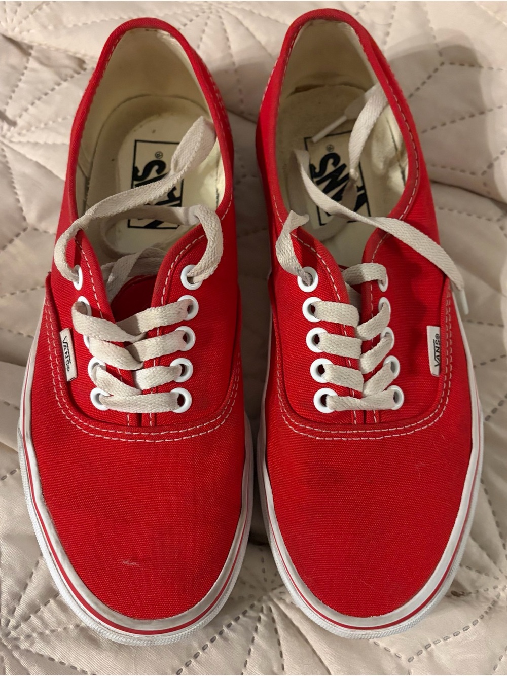 Vans women’s Red Canvas Low-Top Sneakers with White Trim